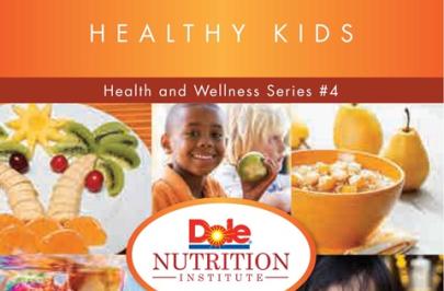 Visual of a child holding a fruit and some healthy foods